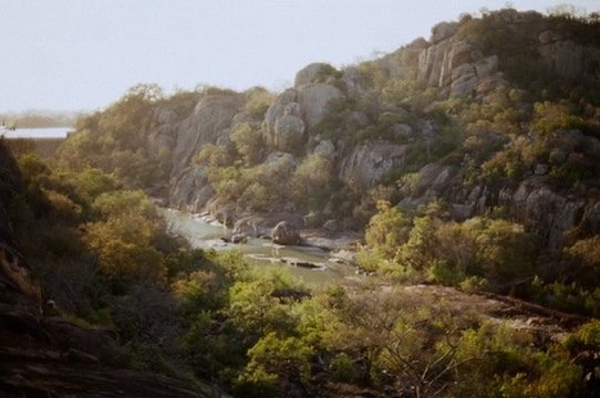 Granite hills and a river